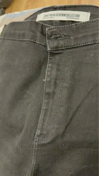 Pantalón pitillo elástico negro con raya lateral