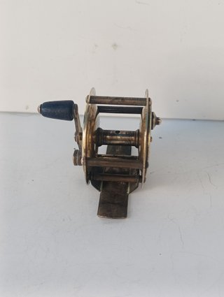 Carrete de pescar a cebo de latón