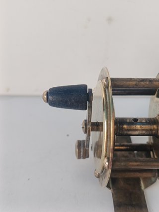 Carrete de pescar a cebo de latón