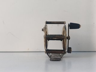 Carrete de pescar a cebo de latón
