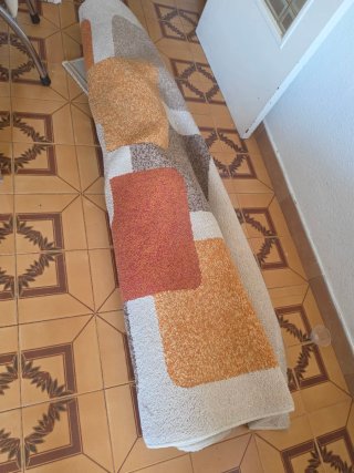 Alfombra de tela con diseño geométrico