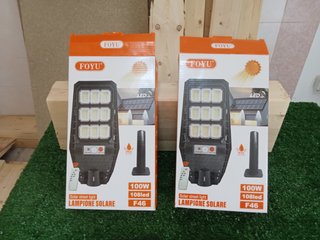 2  lampioni solari da 100w completi di telecomando