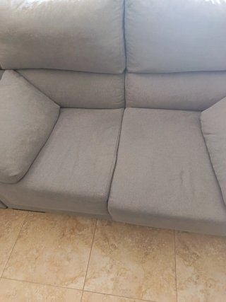 Dos sofás modular gris de tela