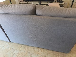 Dos sofás modular gris de tela