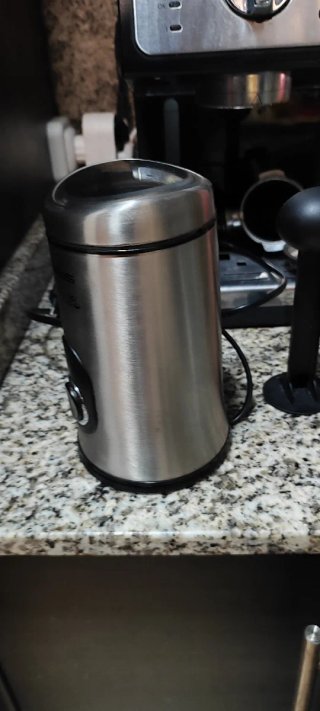 Cafetera Delonghi y Moledora Taurus