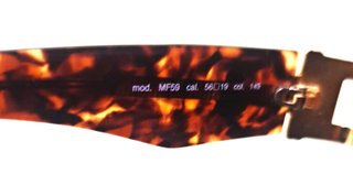 Gafas de sol Sting doradas y negras