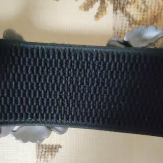 Cinturón elástico negro flores plateadas y strass
