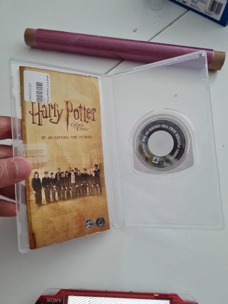 PSP 3000 Roja Transparente + Juego Harry Potter