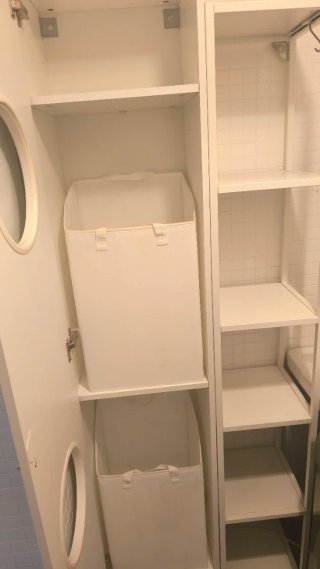 Armario Ikea para colada con 2 cubos para la colaa