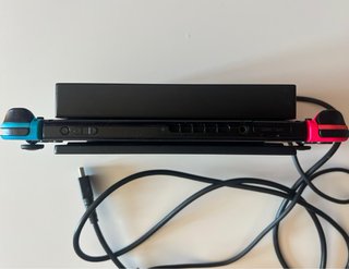 Nintendo Switch Azul/Rosa Neón + Accesorio