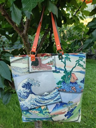 Bolso reversible hecho a mano con asas de piel