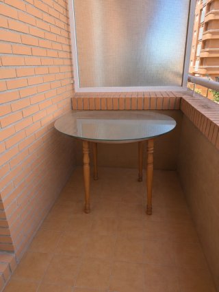 Mesa redonda cristal y madera extensible