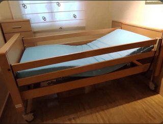 Cama articulada con elevador