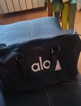 Bolsa de viaje Alo Yoga negra