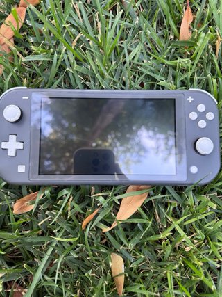 Nintendo Switch Lite nera con Animal Crossing