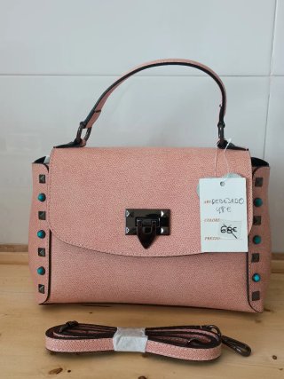Bolso piel rosa tachuelas nuevo