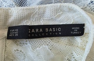 Blusa encaje blanco roto con volantes