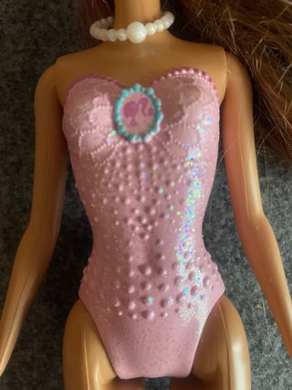 Barbie articulada pelo castaño morena