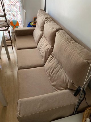 Sofá cama beige tela.