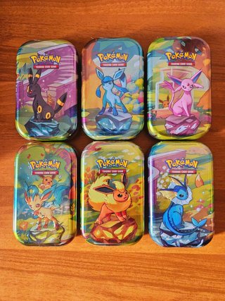 Pokemon Mini Tin Evoluzioni Prismatiche
