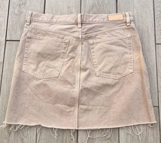 Falda vaquera beige chica