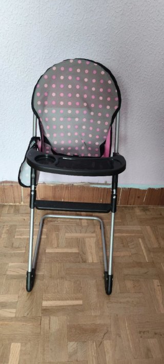 Cochecito de muñecas rosa con lunares