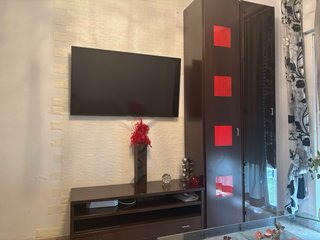 Mueble de salón madera y cristal