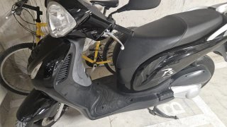 Honda Pasión 125 Scooter Negra, está como nueva