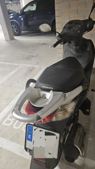 Honda Pasión 125 Scooter Negra, está como nueva