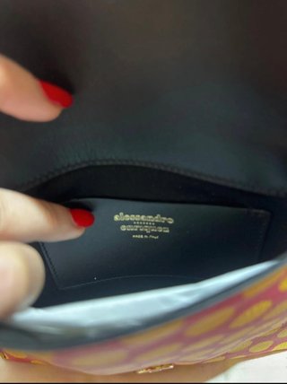 Pochette nuova con custodia originale