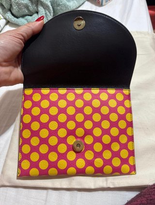 Pochette nuova con custodia originale