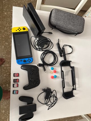 Nintendo Switch + Accesorios y Juegos