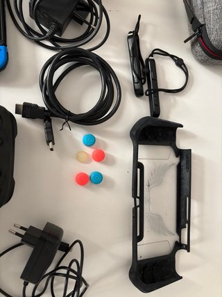 Nintendo Switch + Accesorios y Juegos