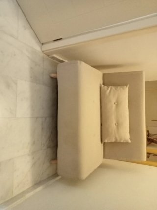 Sofá cama beige de tela
