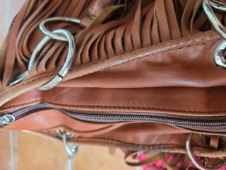 Bolso de piel vintage con flecos