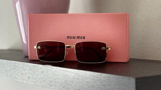 Gafas de sol Miu Miu doradas y marrones
