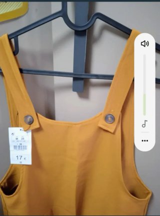 Peto amarillo talla M. Ropa chica