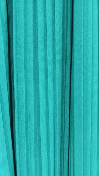 Pantalón de fiesta verde plisado