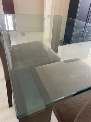 Mesa de comedor de cristal y 4 sillas