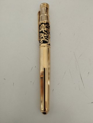 Pluma estilográfica vintage dorada