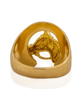 Anillo herradura y cabeza caballo oro 18k