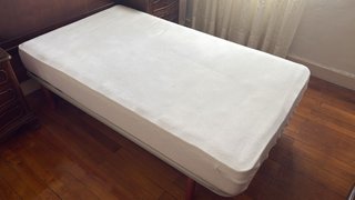 Cama con somier de lamas