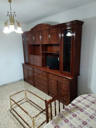 Mueble de salón madera y cristal