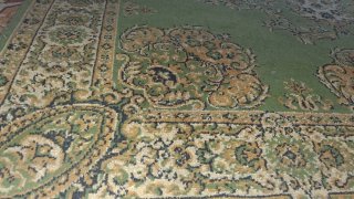 Alfombra antigua de lana