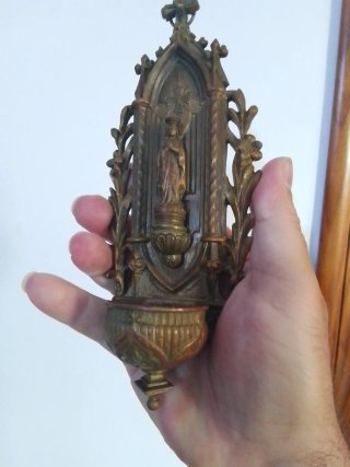 Benditera antigua de bronce