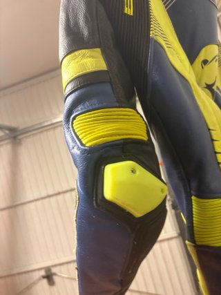 Mono de moto Bela azul y amarillo
