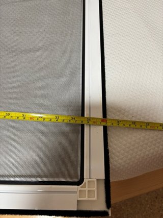 Mosquitera blanca para ventana