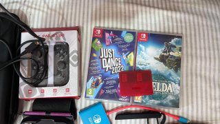 Nintendo Switch OLED + 2 giochi e accessori