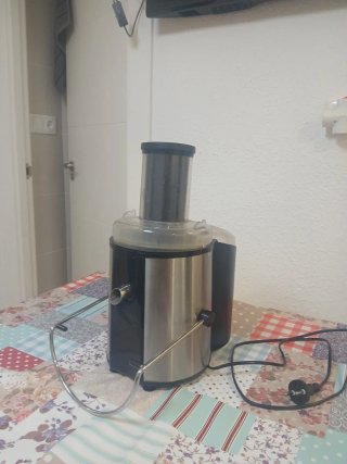 Exprimidor de acero inoxidable