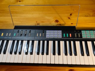 Piano Vintage Yamaha PSR-12 con Funda y Atril